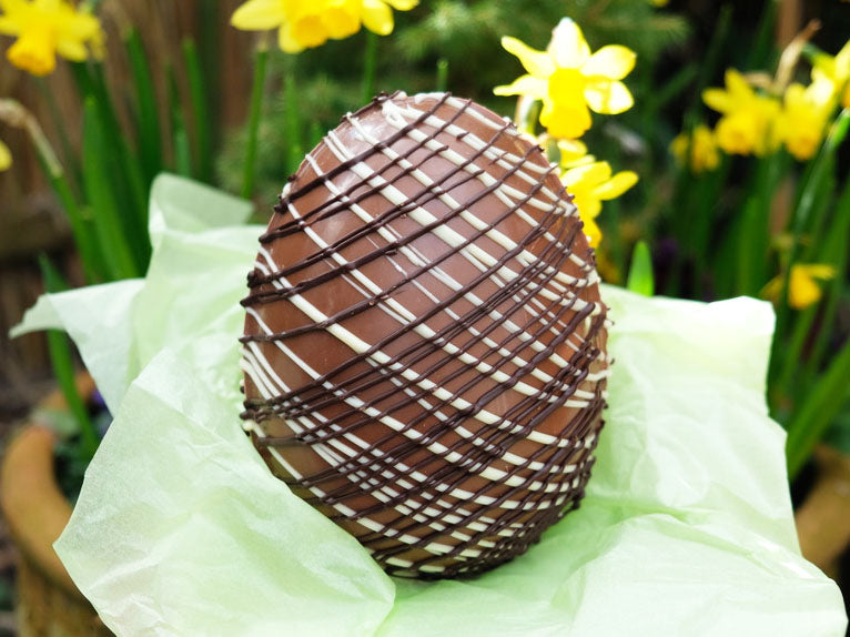 165g Triple Chocolate Drizzled Hand Made Easter Egg