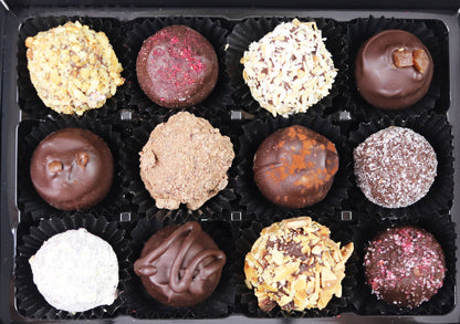  image shows a box of 12 vegan dark chocolate truffles