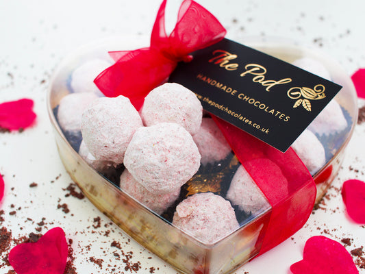 image shows a gift box of 15 hand made prosecco truffles tied with a box